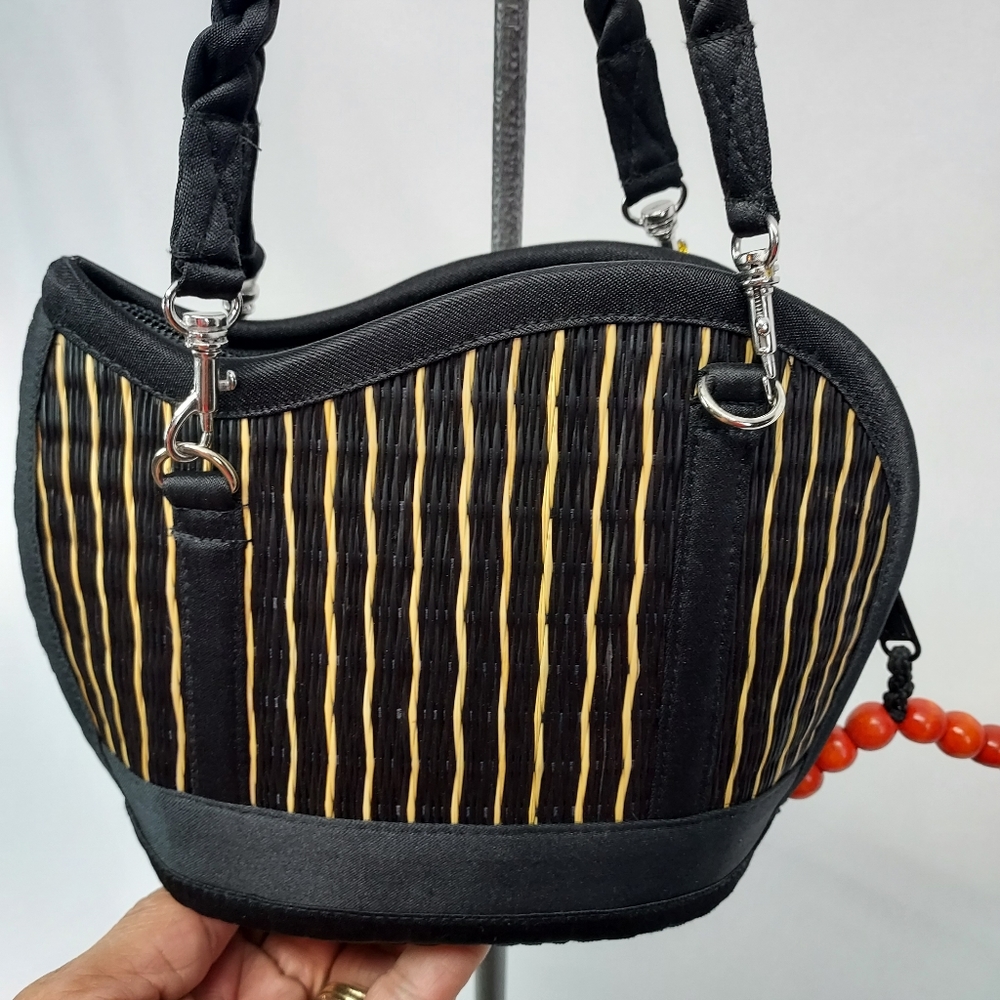 New Saraye black and gold handbag purse.